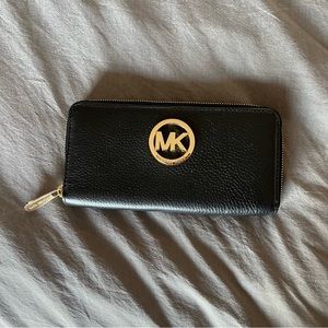 Michael Kors black leather zip around wallet